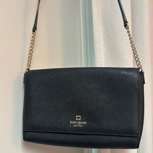 Kate Spade Black and Gold Crossbody Bag with Flap Closure